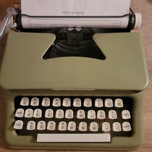 Brand: Tom Thumb; Size: kids; Color: pale green with white keys